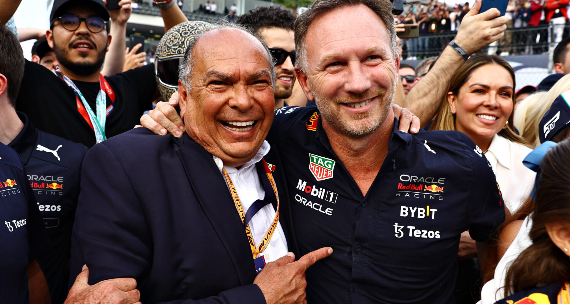 MEXICO CITY, MEXICO - OCTOBER 30: Red Bull Racing Team Principal Christian Horner and Antonio Perez Garibay celebrate in parc ferme during the F1 Grand Prix of Mexico at Autodromo Hermanos Rodriguez on October 30, 2022 in Mexico City, Mexico.