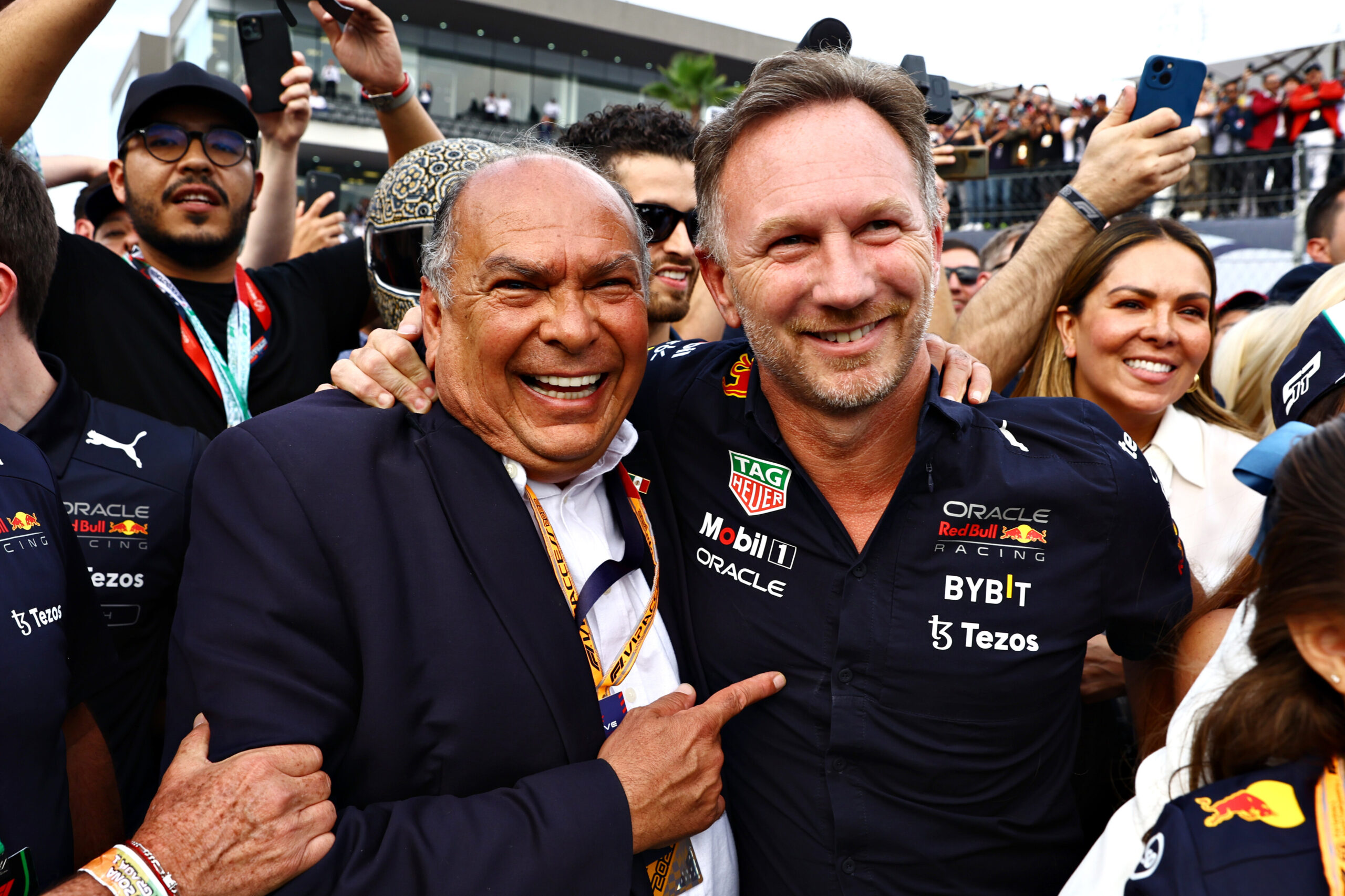 MEXICO CITY, MEXICO - OCTOBER 30: Red Bull Racing Team Principal Christian Horner and Antonio Perez Garibay celebrate in parc ferme during the F1 Grand Prix of Mexico at Autodromo Hermanos Rodriguez on October 30, 2022 in Mexico City, Mexico.